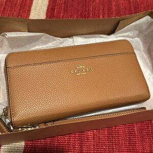 Brand new COACH accordion wristlet